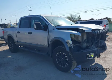 2018 Nissan Titan Pro-4X из США, поврежденный, VIN 1N6AA1E51JN551695